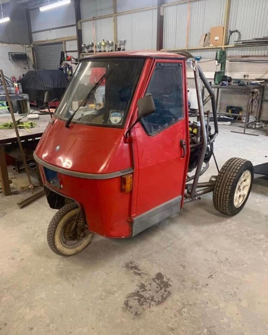 Guy Martin behind the wheel of a Piaggio Ape